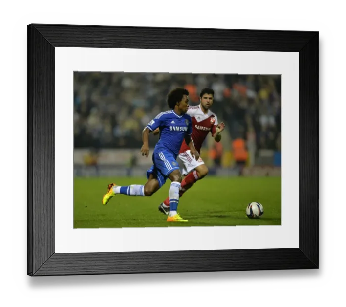 Framed Print : Willian in Action: Chelsea's Star Player Takes On Swindon Town in Capital One Cup Third Round
