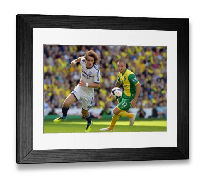 Framed Print : David Luiz vs. Anthony Pilkington: A Football Showdown at Carrow Road - Barclays Premier League (6th October 2013)