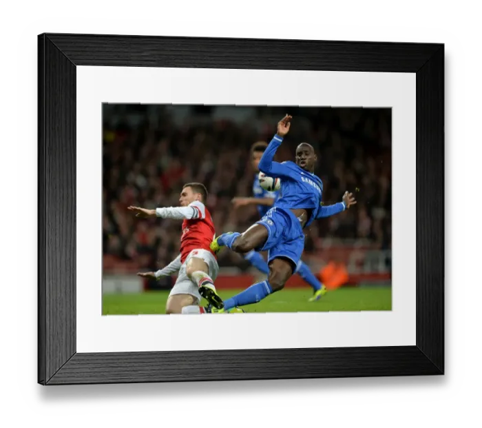Framed Print : Battle for the Ball: Vermaelen vs. Ba - Arsenal vs. Chelsea Rivalry at Emirates Stadium (October 29, 2013) Framed Print : Battle for the Ball: Vermaelen vs. Ba - Arsenal vs. Chelsea Rivalry at Emirates Stadium (October 29, 2013)