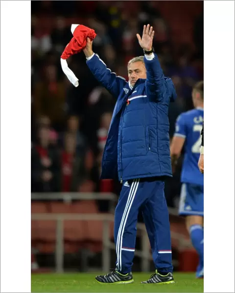 Mourinho's Triumphant Salute: Honoring Ozil after Chelsea's Capital One Cup Victory at Arsenal's Emirates Stadium (29th October 2013)