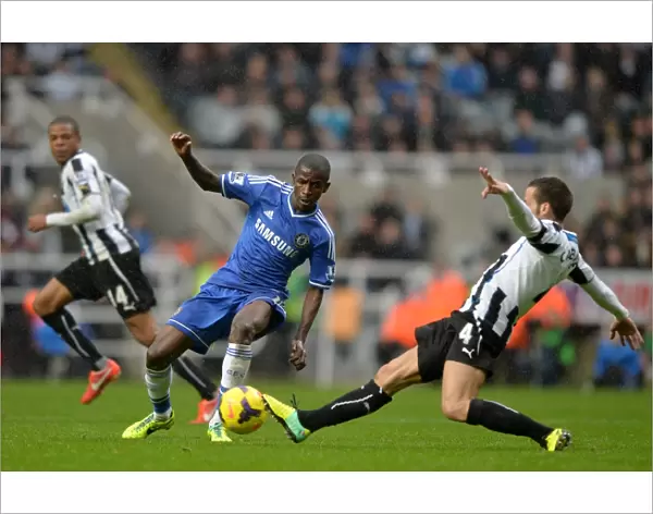 Intense Battle for Ball Possession: Ramires vs. Cabaye - Newcastle United vs. Chelsea (November 2013)