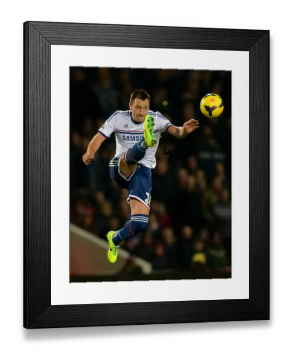 Framed Print : John Terry at Upton Park: Chelsea's Battle against West Ham United, Barclays Premier League (November 23, 2013)