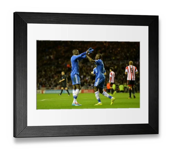 Framed Print : Chelsea's Unintentional Victory: Ramires and Demba Ba Celebrate Own Goal Against Sunderland (December 2013) Framed Print : Chelsea's Unintentional Victory: Ramires and Demba Ba Celebrate Own Goal Against Sunderland (December 2013)