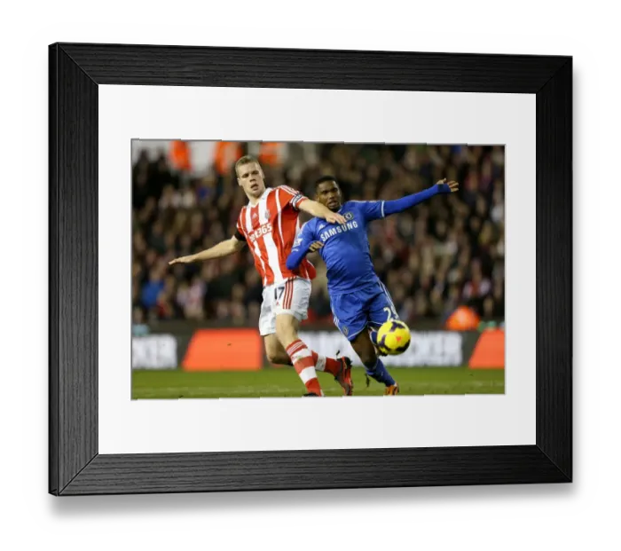Framed Print : Intense Battle: Eto'o vs. Shawcross at Britannia Stadium - A Premier League Clash Framed Print : Intense Battle: Eto'o vs. Shawcross at Britannia Stadium - A Premier League Clash