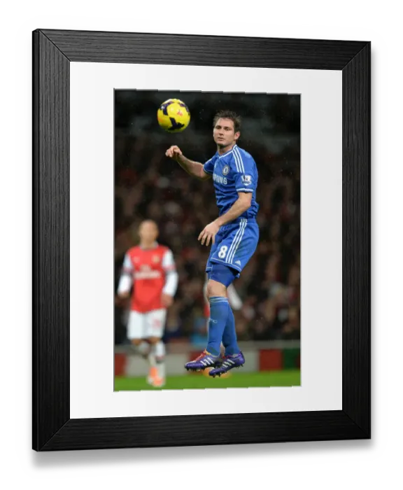 Framed Print : Frank Lampard Soaring High: Heading the Ball Against Arsenal in the Premier League Rivalry (December 23, 2013) Framed Print : Frank Lampard Soaring High: Heading the Ball Against Arsenal in the Premier League Rivalry (December 23, 2013)