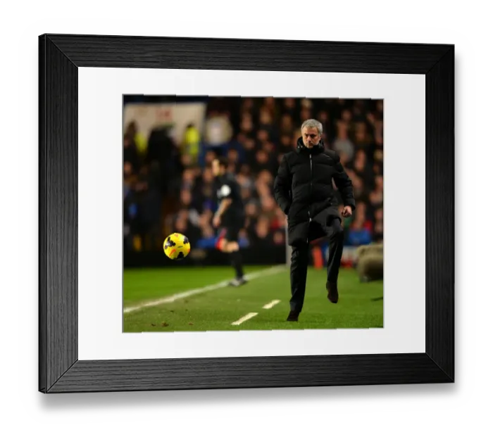 Framed Print : Jose Mourinho in Action: Chelsea Boss Masterfully Controls Ball on Touchline Amidst Chelsea vs. West Ham United, Barclays Premier League (January 29, 2014)