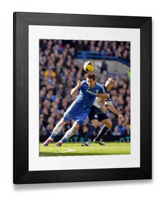 Framed Print : Lampard vs Osman: A Premier League Battle at Stamford Bridge (Chelsea vs Everton, 22nd February 2014) Framed Print : Lampard vs Osman: A Premier League Battle at Stamford Bridge (Chelsea vs Everton, 22nd February 2014)