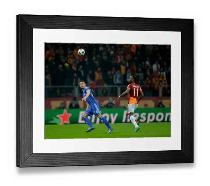Framed Print : Battle for the Ball: Drogba vs. Cahill - Galatasaray vs. Chelsea UCL Showdown (February 2014) Framed Print : Battle for the Ball: Drogba vs. Cahill - Galatasaray vs. Chelsea UCL Showdown (February 2014)