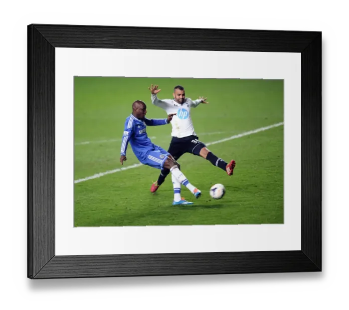 Framed Print : Demba Ba Scores Second Stunning Goal Against Tottenham Hotspur at Stamford Bridge (8th March 2014) Framed Print : Demba Ba Scores Second Stunning Goal Against Tottenham Hotspur at Stamford Bridge (8th March 2014)