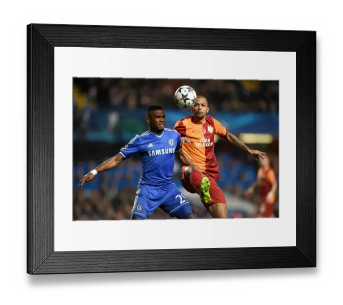 Framed Print : A Battle for the Ball: Eto'o vs. Melo in the UEFA Champions League Round of 16 Showdown at Stamford Bridge, March 18, 2014 Framed Print : A Battle for the Ball: Eto'o vs. Melo in the UEFA Champions League Round of 16 Showdown at Stamford Bridge, March 18, 2014