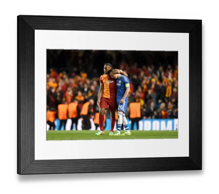 Framed Print : John Terry and Didier Drogba's Embrace: Ending a Rivalry – Chelsea vs. Galatasaray in the UEFA Champions League (18th March 2014)