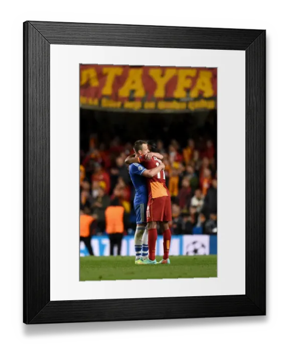 Framed Print : Ending a Rivalry: John Terry and Didier Drogba's Embrace - Chelsea vs. Galatasaray in the UEFA Champions League (18th March 2014)