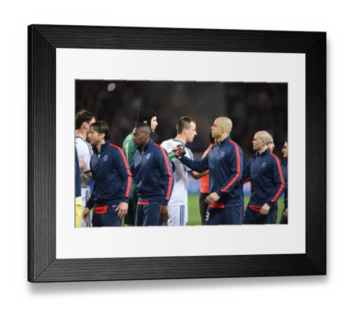 Framed Print : Quarter-Final Showdown: Handshake Moment - Paris Saint-Germain vs. Chelsea at Parc des Princes (UEFA Champions League, April 2014)