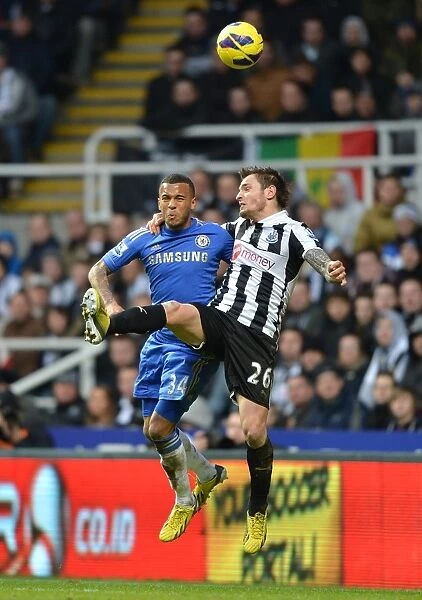 Battle for the Ball: Bertrand vs Debuchy - Intense Aerial Clash in Chelsea vs Newcastle United (February 2013)