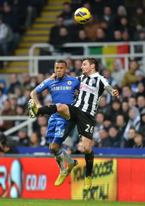 Framed Print : Battle for the Ball: Bertrand vs Debuchy - Intense Aerial Clash in Chelsea vs Newcastle United (February 2013) Framed Print : Battle for the Ball: Bertrand vs Debuchy - Intense Aerial Clash in Chelsea vs Newcastle United (February 2013)