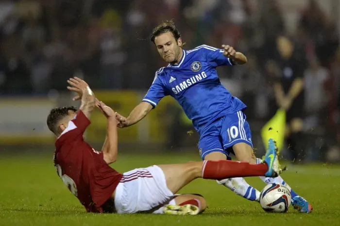 Framed Print : Battle for the Ball: Juan Mata vs. Grant Hall - Swindon Town's Courageous Stand against Chelsea