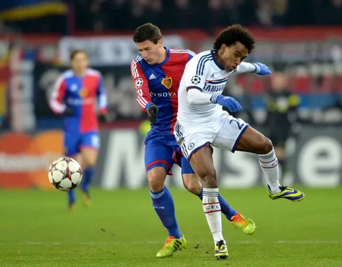 Framed Print : Battle for the Ball: Willian vs. Schar in UEFA Champions League Clash between Chelsea and FC Basel Framed Print : Battle for the Ball: Willian vs. Schar in UEFA Champions League Clash between Chelsea and FC Basel