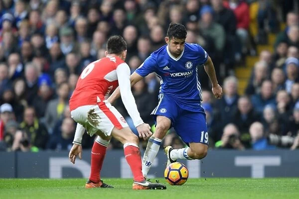 Battle at Stamford Bridge: Diego Costa vs. Laurent Koscielny - Intense Rivalry between Chelsea and Arsenal Players