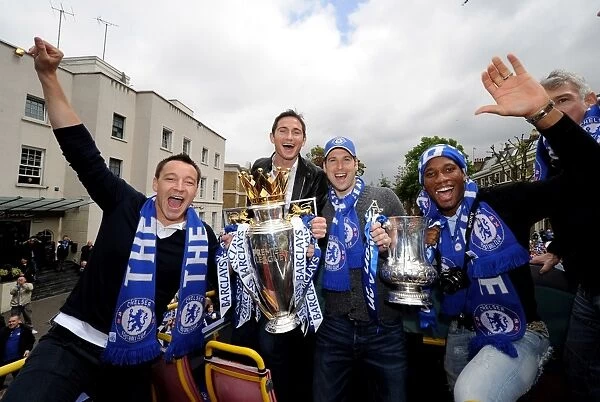 Chelsea Champions 2010: Terry, Lampard, Cech, and Drogba with Premier League and FA Cup Trophies
