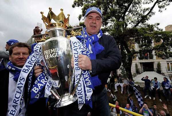 Chelsea FC: Premier League Champions - Carlo Ancelotti Celebrates with the Trophy at Victory Parade in London, 2010
