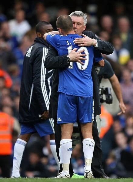 Chelsea Football Club: Premier League Victory 2009-2010 - Joe Cole and Carlo Ancelotti Embrace Triumph