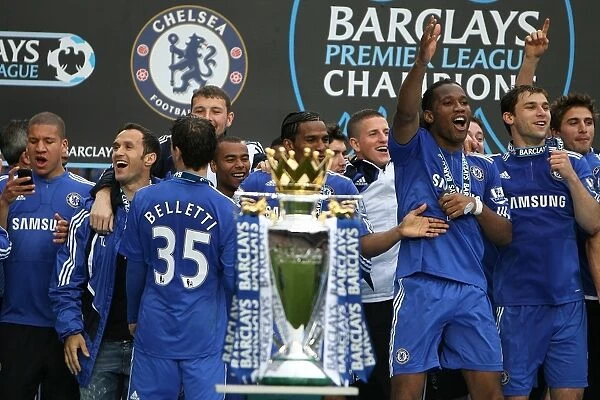 Chelsea players celebrate after winning the Premier League title at Stamford Bridge