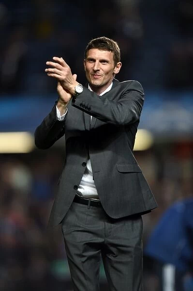 Former Chelsea Star Tore Andre Flo Pays Tribute to Fans at Stamford Bridge During Champions League Match against Galatasaray (18th March 2014)