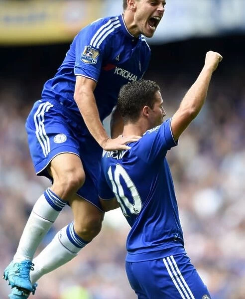 Chelsea's Eden Hazard and Cesar Azpilicueta: A Dynamic Duo Celebrates Their Second Goal Against Arsenal in the Premier League