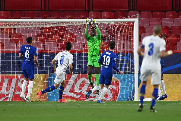 Chelsea's Edouard Mendy Makes Saving in Empty Estadio Ramon Sanchez Pizjuan during UEFA Champions League Quarterfinals vs Porto