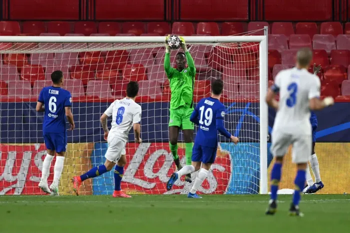 Framed Print : Chelsea's Edouard Mendy Makes Saving in Empty Estadio Ramon Sanchez Pizjuan during UEFA Champions League Quarterfinals vs Porto Framed Print : Chelsea's Edouard Mendy Makes Saving in Empty Estadio Ramon Sanchez Pizjuan during UEFA Champions League Quarterfinals vs Porto