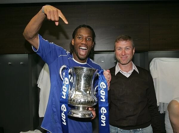 Chelsea's FA Cup Victory: Didier Drogba and Roman Abramovich Celebrate with the Trophy (May 2007)