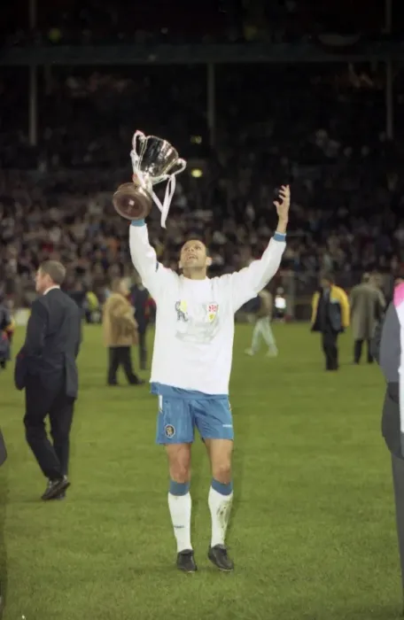 Framed Print : Chelsea's Gus Poyet Hoists the UEFA European Cup-Winners Cup after Victory over VfB Stuttgart, 1998 Framed Print : Chelsea's Gus Poyet Hoists the UEFA European Cup-Winners Cup after Victory over VfB Stuttgart, 1998