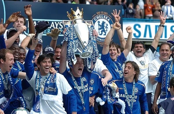 Chelsea's John Terry Celebrates Premier League Victory with the Trophy at Stamford Bridge (2005-2006)