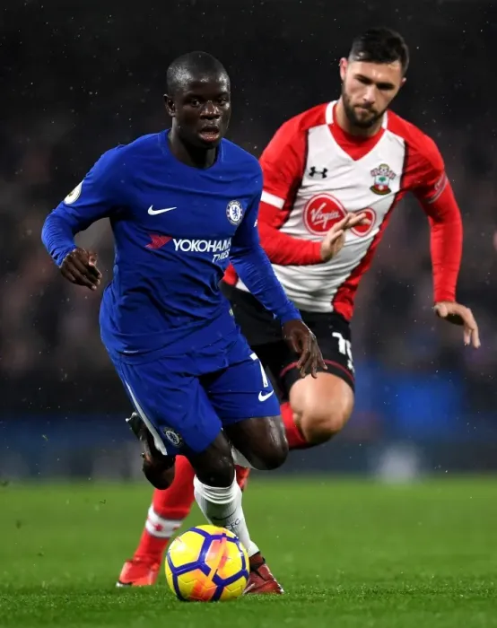 Framed Print : Chelsea's N'Golo Kante Outmaneuvers Southampton's Charlie Austin during Premier League Clash at Stamford Bridge