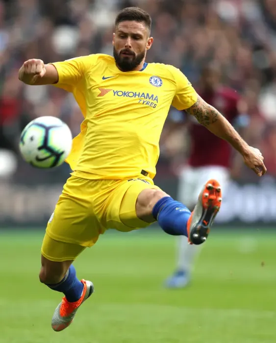 Framed Print : Chelsea's Olivier Giroud Reaches for the Ball in Intense West Ham Clash Framed Print : Chelsea's Olivier Giroud Reaches for the Ball in Intense West Ham Clash
