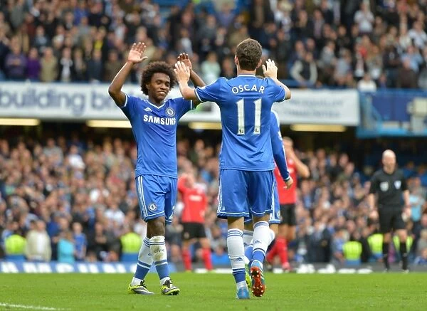 Chelsea's Oscar and Willian: Unstoppable Duo Celebrates Their Third Goal Against Fulham (September 2013)