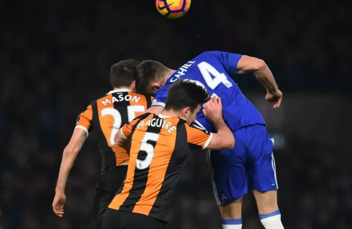 Framed Print : Clash at Stamford Bridge: Intense Battle Between Gary Cahill and Ryan Mason Framed Print : Clash at Stamford Bridge: Intense Battle Between Gary Cahill and Ryan Mason
