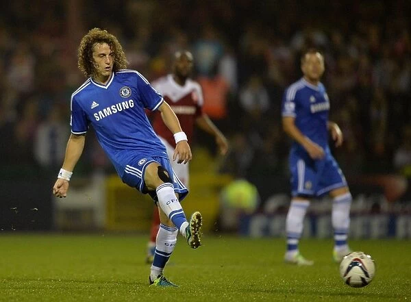 David Luiz in Action: Chelsea's Thrilling Pass at Swindon Town's County Ground during Capital One Cup Third Round (September 24, 2013)