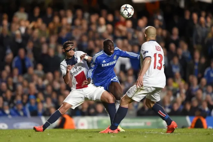 Framed Print : Demba Ba Fights for Ball Against Thiago Silva and Alex in Intense Chelsea vs. Paris Saint-Germain UEFA Champions League Clash (April 8, 2014)