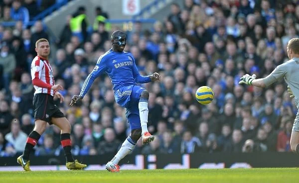 Determined Demba Ba: Chelsea Star's Brave Attempt Against Brentford Goalkeeper in FA Cup Fourth Round Replay