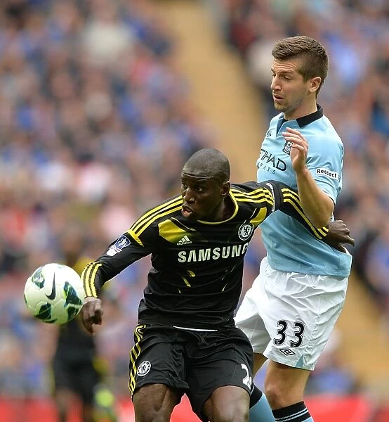 FA Cup Semi-Final Showdown: A Battle Between Chelsea's Demba Ba and Manchester City's Matija Nastasic at Wembley Stadium (April 14, 2013)