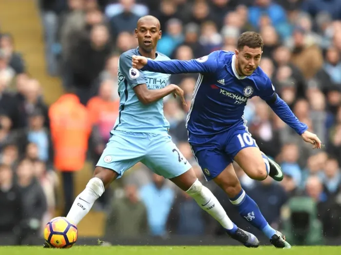 Framed Print : Hazard vs Fernandinho: A Premier League Showdown at Etihad Stadium