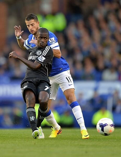 Intense Battle for Ball Possession: Ramires vs. Mirallas at Goodison Park - Everton vs. Chelsea, Barclays Premier League (September 14, 2013)