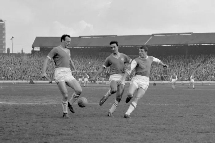 Framed Print : Intense Moment: David Herd of Arsenal Takes a Shot Against Chelsea's John Sillett and Mel Scott at Stamford Bridge