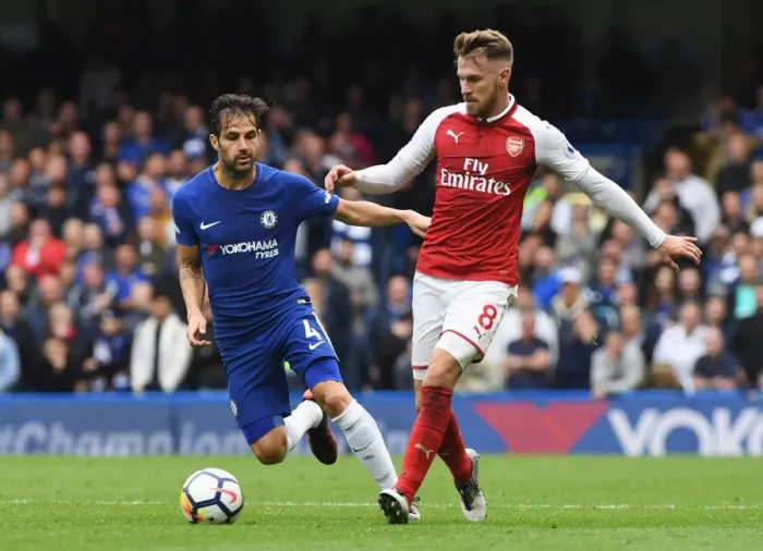 Framed Print : Intense Rivalry: Fabregas vs Ramsey Battle at Stamford Bridge, Premier League Framed Print : Intense Rivalry: Fabregas vs Ramsey Battle at Stamford Bridge, Premier League