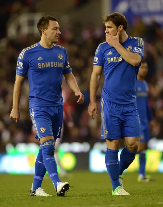 Framed Print : John Terry and Branislav Ivanovic in Action: Chelsea vs Stoke City (12th January 2013) Framed Print : John Terry and Branislav Ivanovic in Action: Chelsea vs Stoke City (12th January 2013)