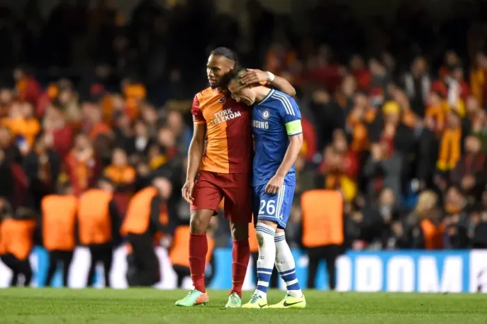 Framed Print : John Terry and Didier Drogba's Embrace: Ending a Rivalry – Chelsea vs. Galatasaray in the UEFA Champions League (18th March 2014)