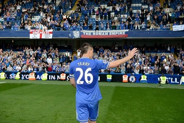 John Terry's Triumphant Moment: Chelsea Captain Celebrates Champions League Victory with Adoring Fans (Chelsea vs Norwich City, Stamford Bridge, May 4, 2014)