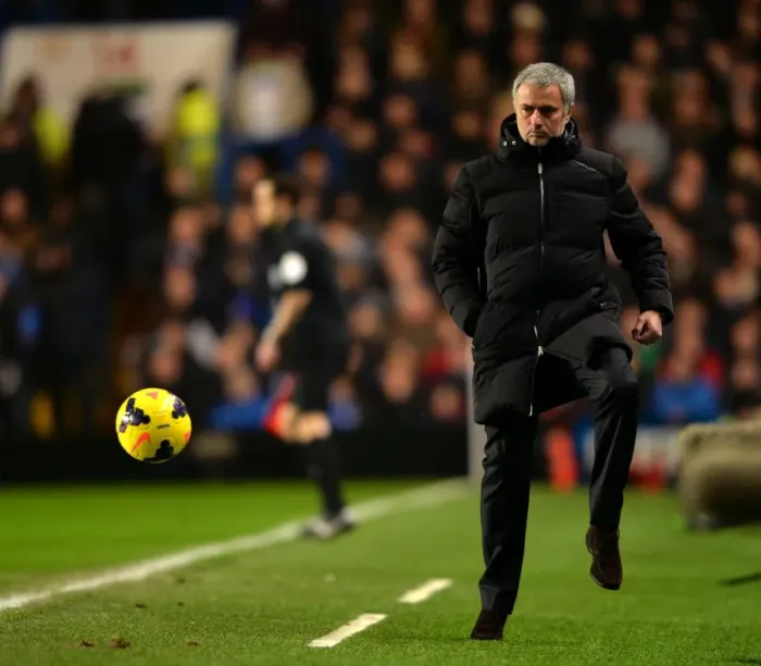 Framed Print : Jose Mourinho in Action: Chelsea Boss Masterfully Controls Ball on Touchline Amidst Chelsea vs. West Ham United, Barclays Premier League (January 29, 2014)