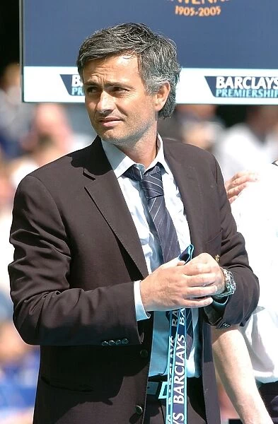 Jose Mourinho's Euphoric Moment: Celebrating Premier League Glory with Chelsea vs. Manchester United, 2005-2006 (Throwing the Trophy into the Crowd)